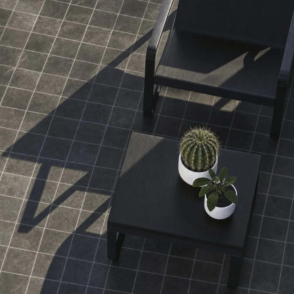Pavimento exterior de porcelánico en tono oscuro